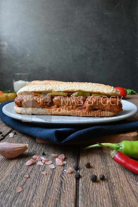 Close up of a delicious sausage sandwich, delicious fast food meals, Arabic restaurants, delicious food recipes, delicious food, sausage sandwich