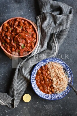 Top view of a delicious okra dish with sauce and meat, Plate rice, Arabic meals, recipes and delicious food dishes, delicious meals, delicious food, okra dish