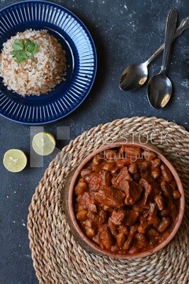 Top view of a delicious okra dish with sauce and meat, Plate rice, Arabic meals, recipes and delicious food dishes, delicious meals, delicious food, okra dish