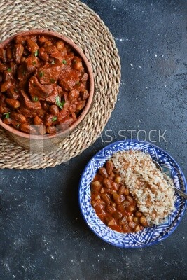 Top view of a delicious okra dish with sauce and meat, Plate rice, Arabic meals, recipes and delicious food dishes, delicious meals, delicious food, okra dish