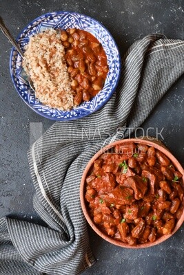 Top view of a delicious okra dish with sauce and meat, Plate rice, Arabic meals, recipes and delicious food dishes, delicious meals, delicious food, okra dish