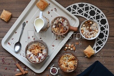 Plate of om ali with nuts on it