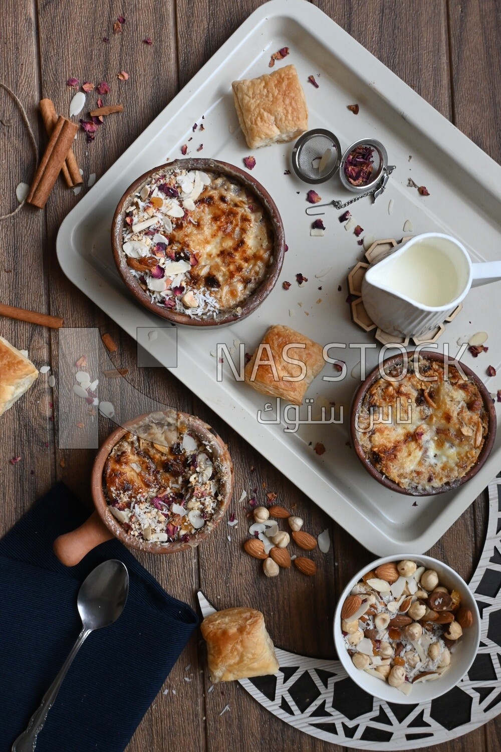Plate of om ali with nuts on it
