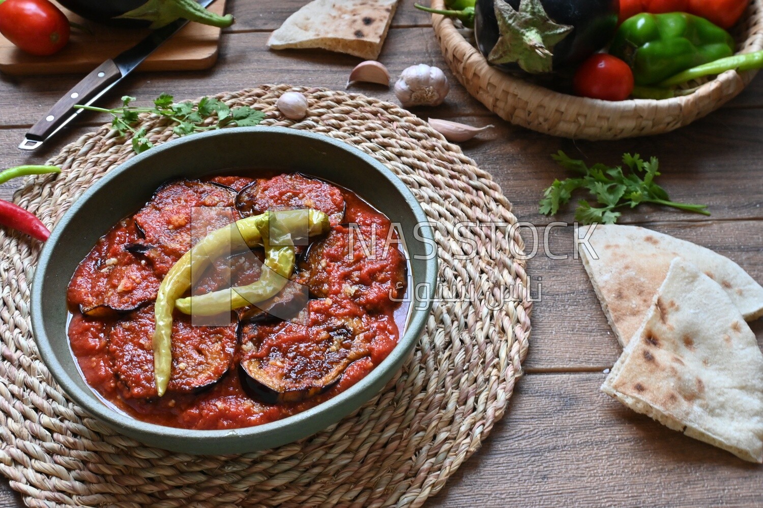 Plate of egyptian mesaka with green pepper on it.