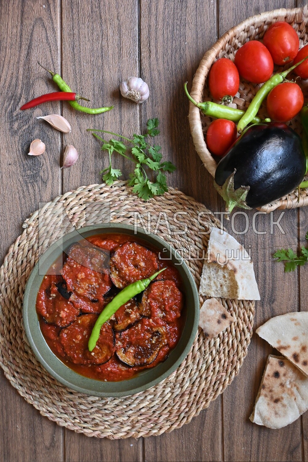 The ingredients of mesaka beside a plate of mesaka