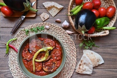 The ingredients of mesaka beside a plate of mesaka