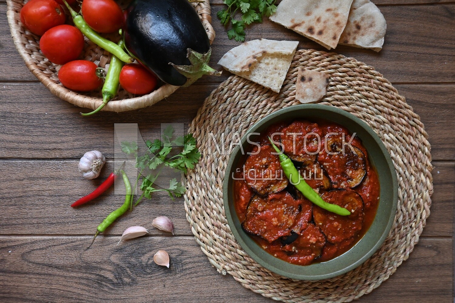 The ingredients of mesaka beside a plate of mesaka