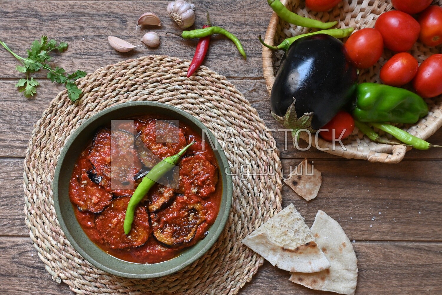 The ingredients of mesaka beside a plate of mesaka