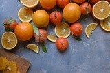 Oranges with orange slices on the table​