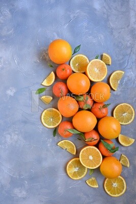 Oranges with orange slices on the table​