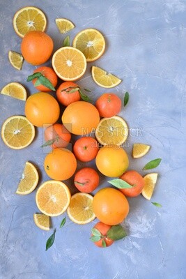 Oranges with orange slices on the table​