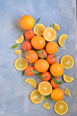 Oranges with orange slices on the table​