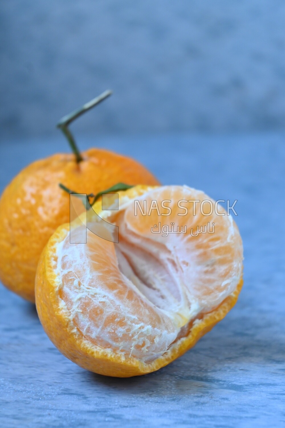 Tangerine on a blue background