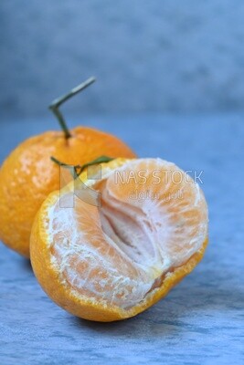 Tangerine on a blue background