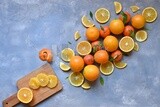 Oranges with orange slices on the table​