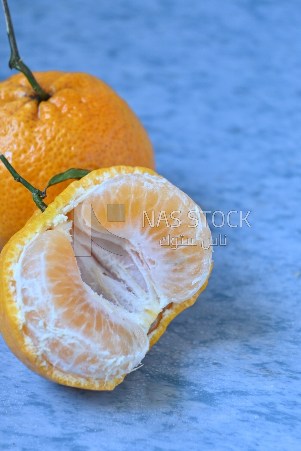 Tangerine on a blue background