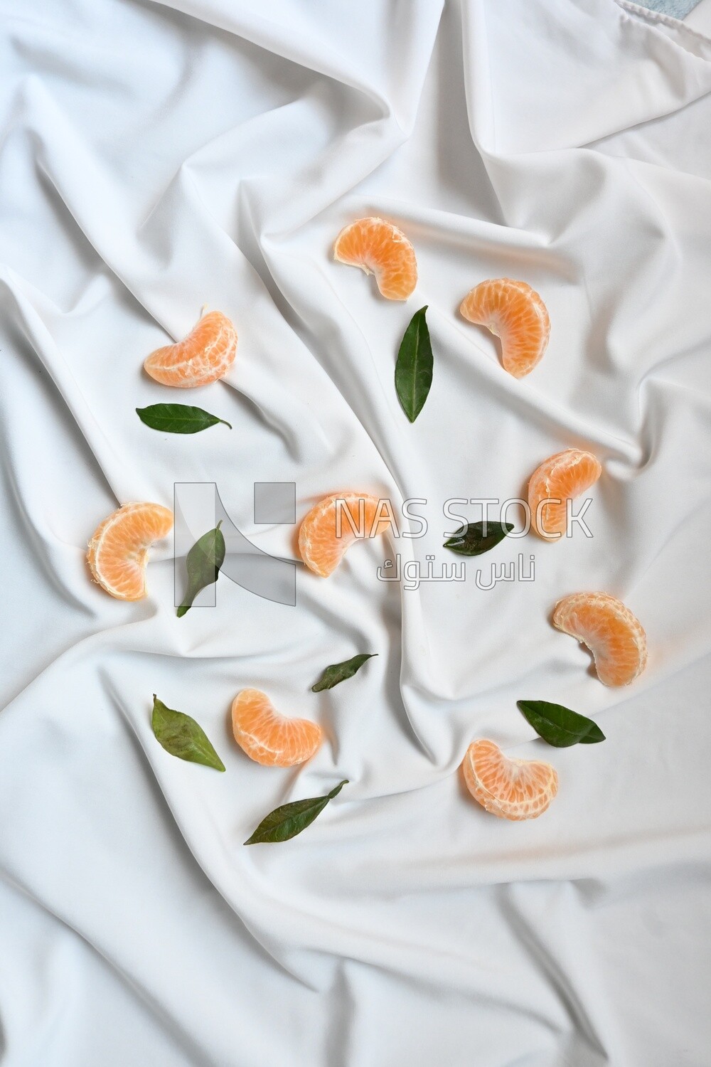 Tangerine slices on a white background​