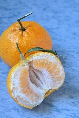Tangerine on a blue background
