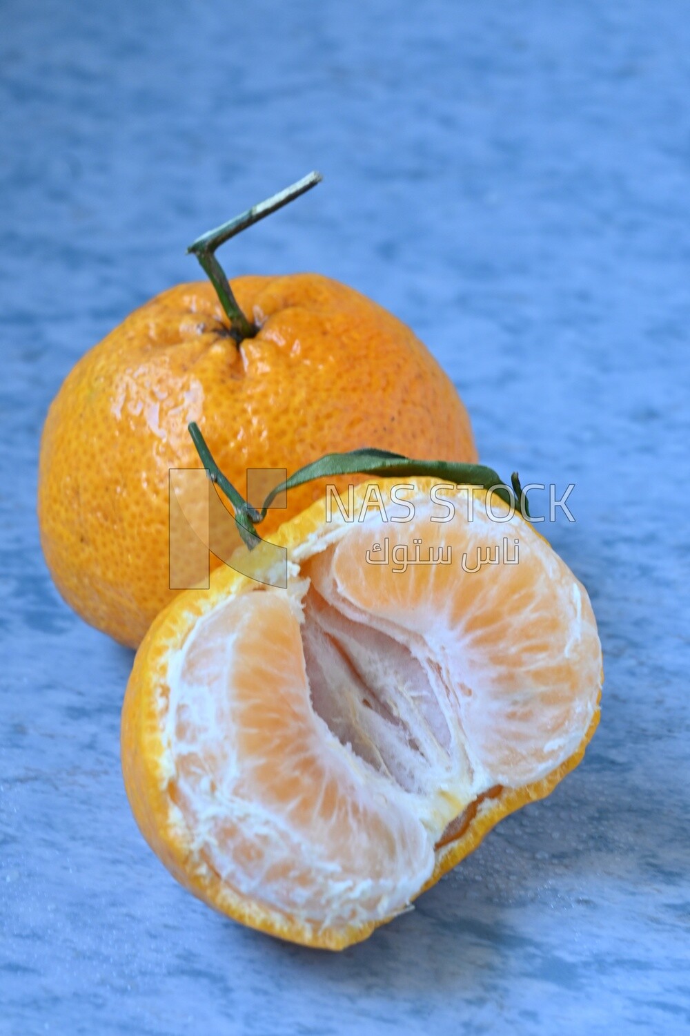 Tangerine on a blue background