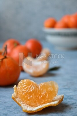 Tangerine slices on a white background​