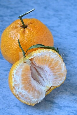 Tangerine on a blue background