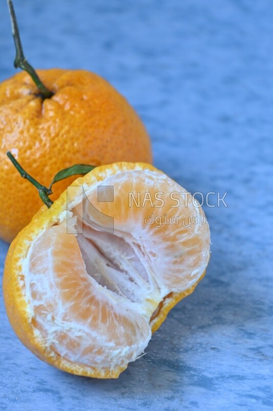 Tangerine on a blue background