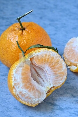Tangerine on a blue background