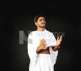 A man wearing an ihram dress