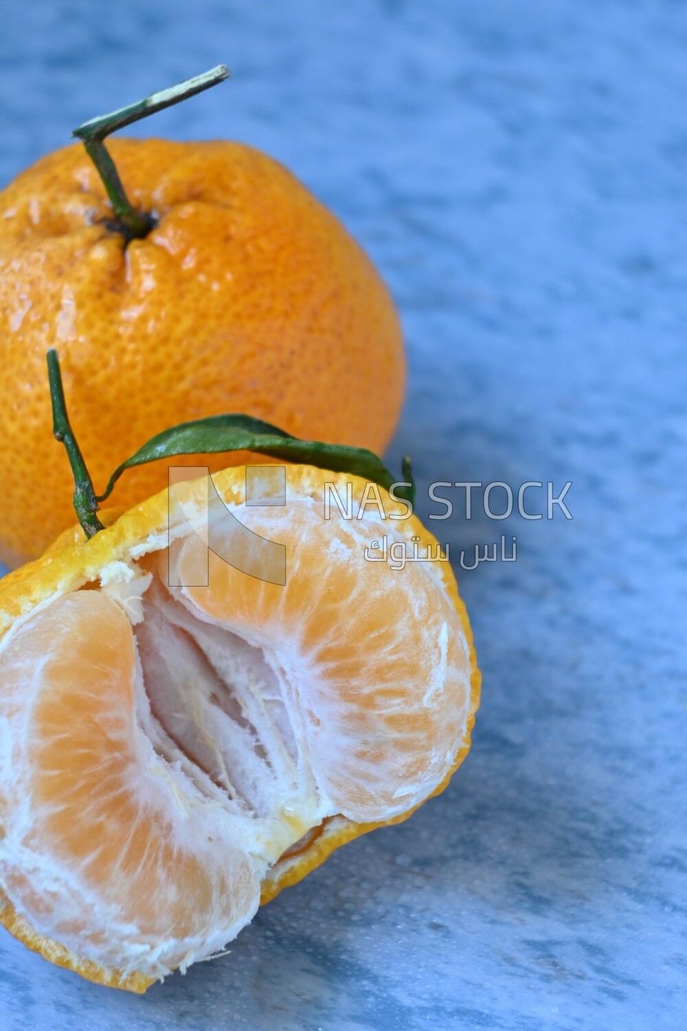 Tangerine on a blue background