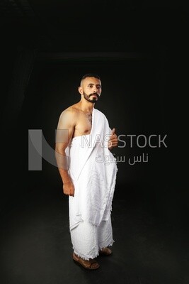 A man wearing an ihram dress