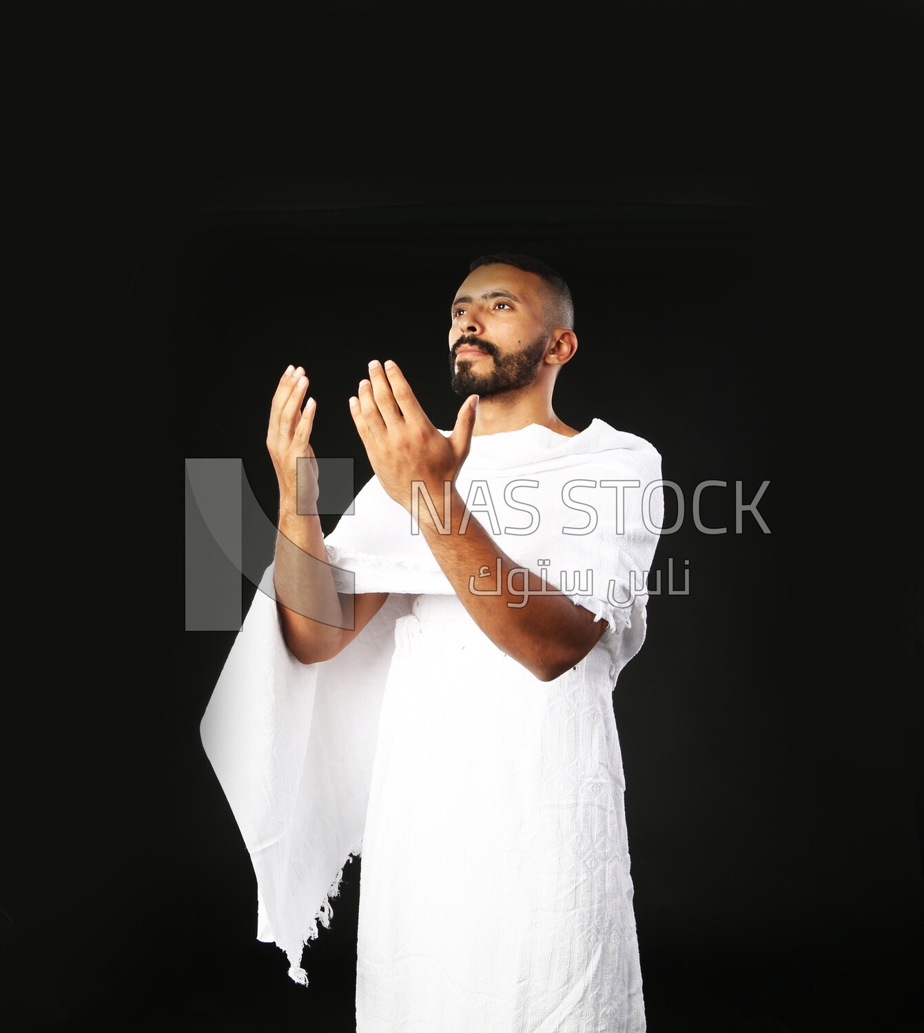 A man wearing an ihram dress