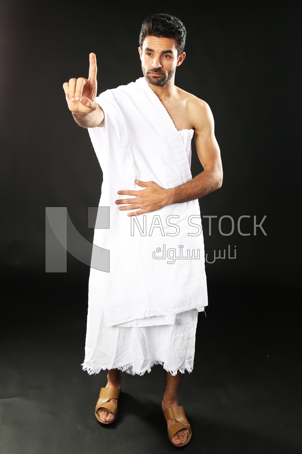 A man wearing an ihram dress