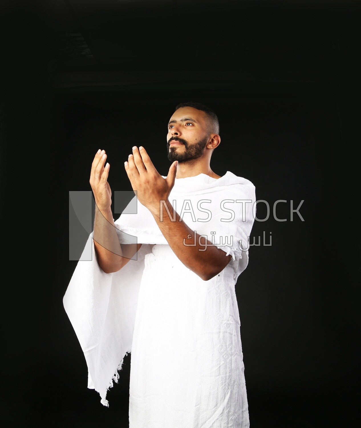 A man wearing an ihram dress