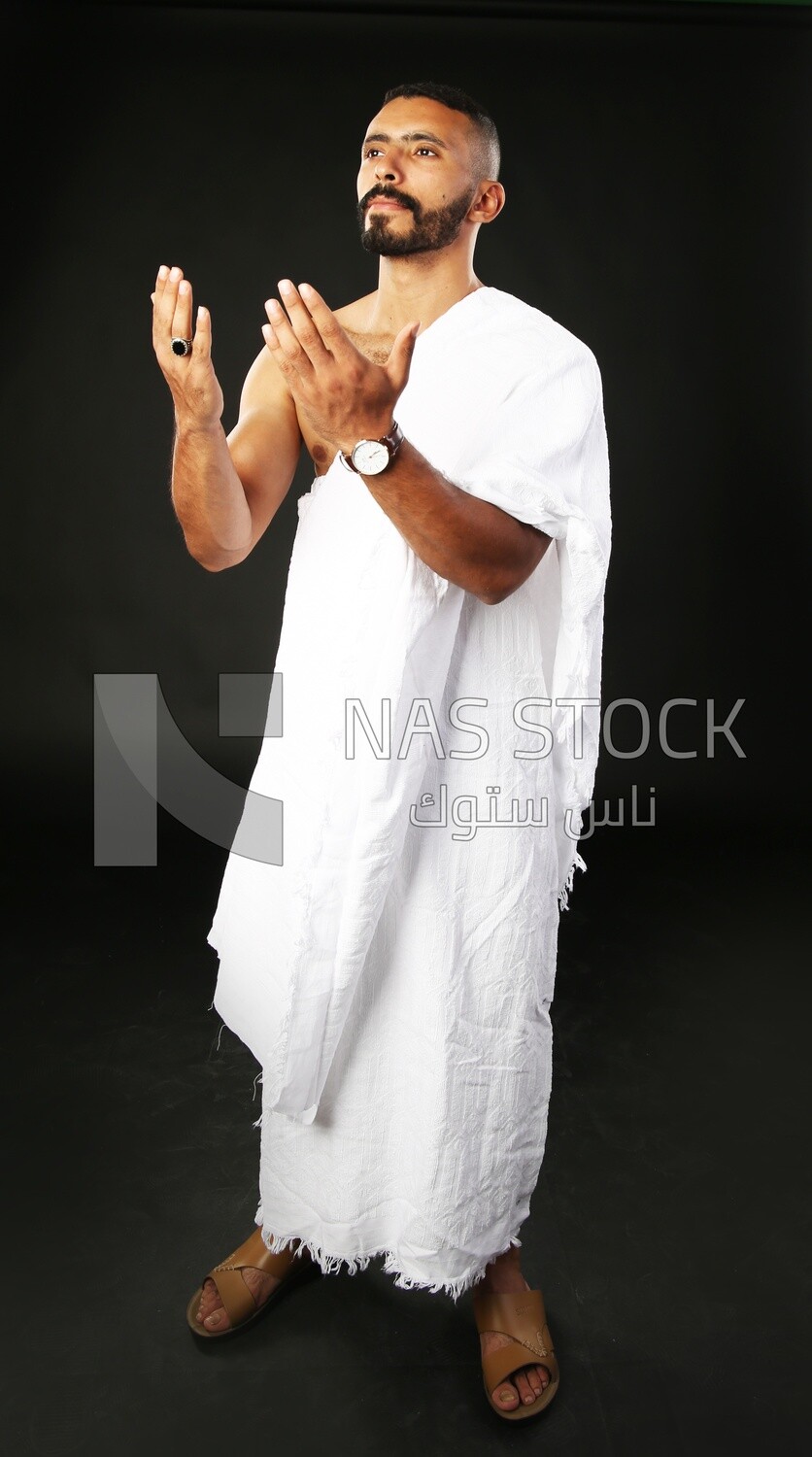 A man wearing an ihram dress