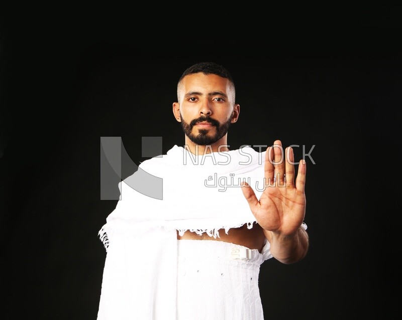 A man wearing an ihram dress