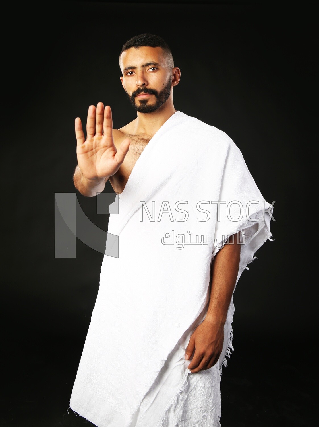 A man wearing an ihram dress