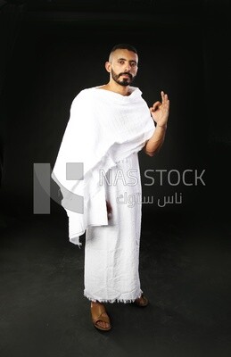 A man wearing an ihram dress
