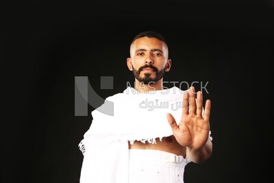 A man wearing an ihram dress