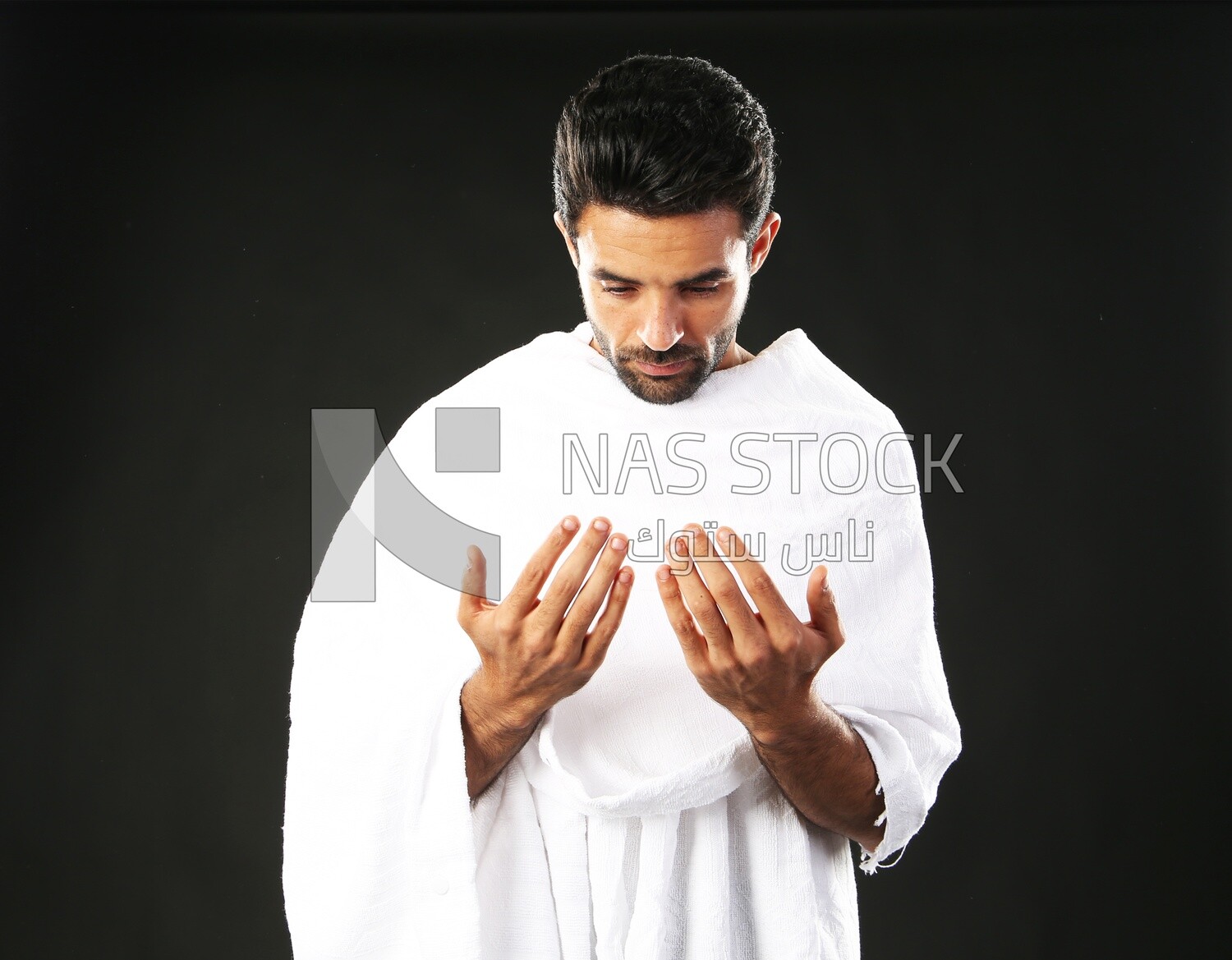 A man wearing an ihram dress