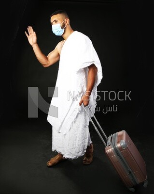 A man wearing an ihram dress