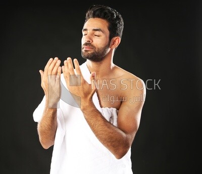A man wearing an ihram dress