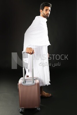 A man wearing an ihram dress