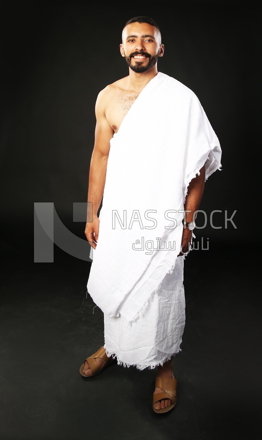 A man wearing an ihram dress
