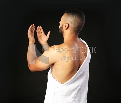 A man wearing an ihram dress
