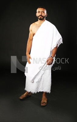A man wearing an ihram dress