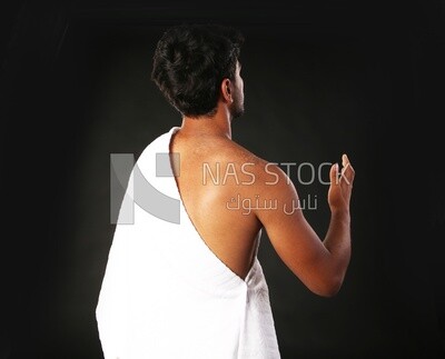 A man wearing an ihram dress
