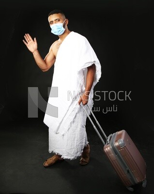 A man wearing an ihram dress