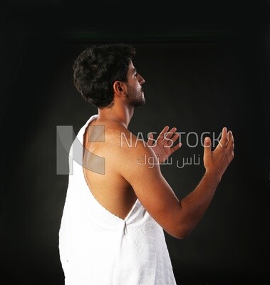 A man wearing an ihram dress