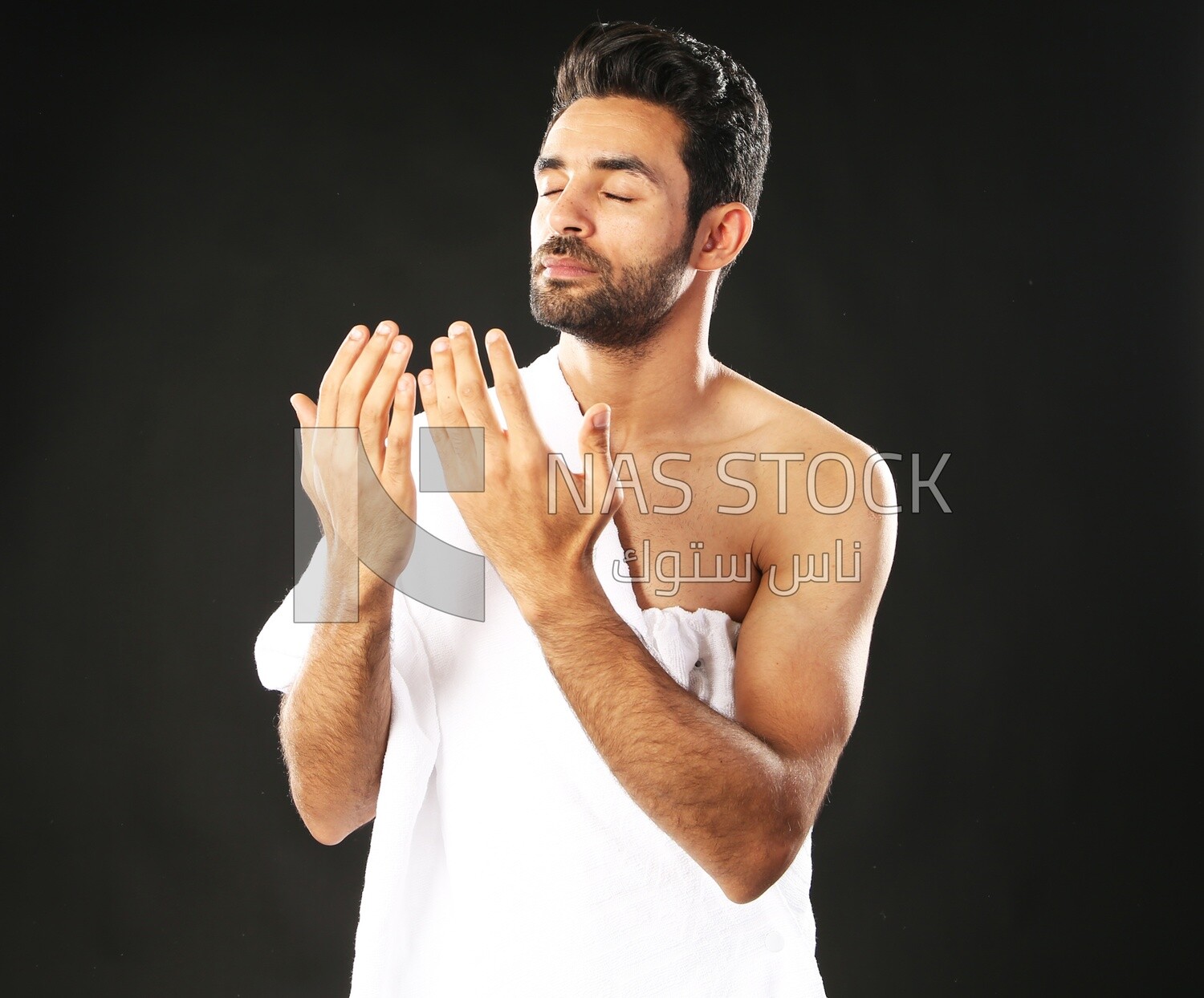 A man wearing an ihram dress