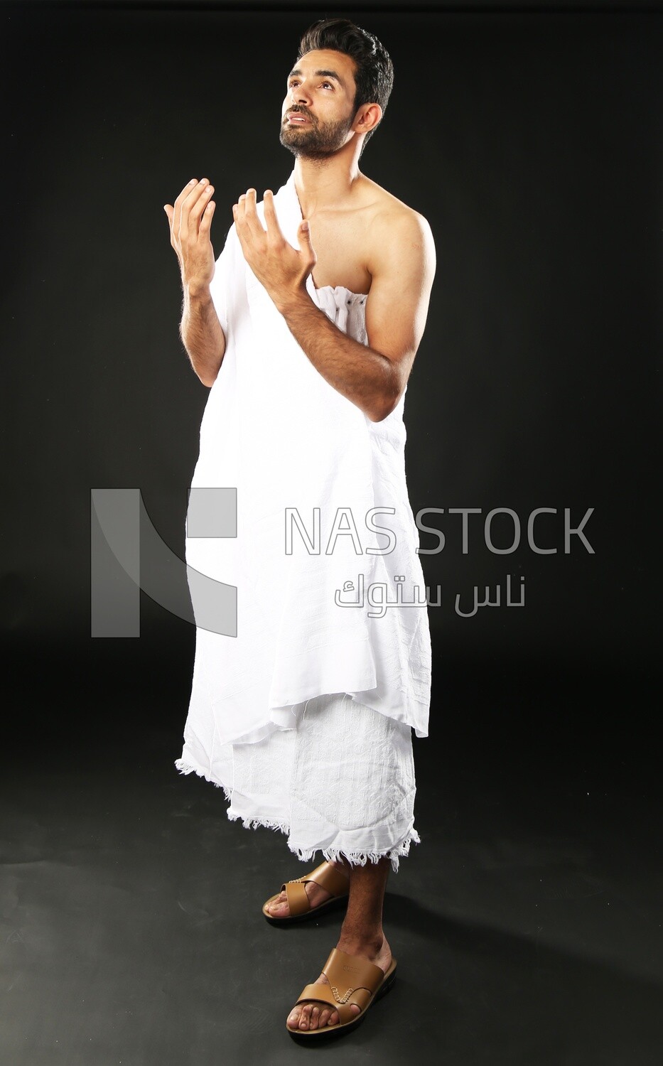 A man wearing an ihram dress